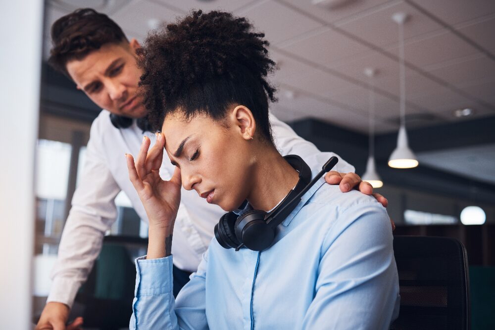 harassed woman at work
