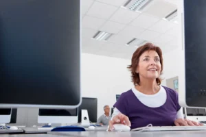 A man working on a desktop computer